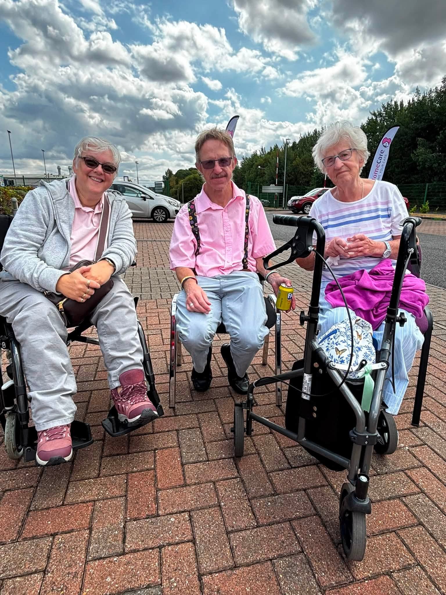 Three Your Home Care clients enjoying the sunshine at the annual BBQ