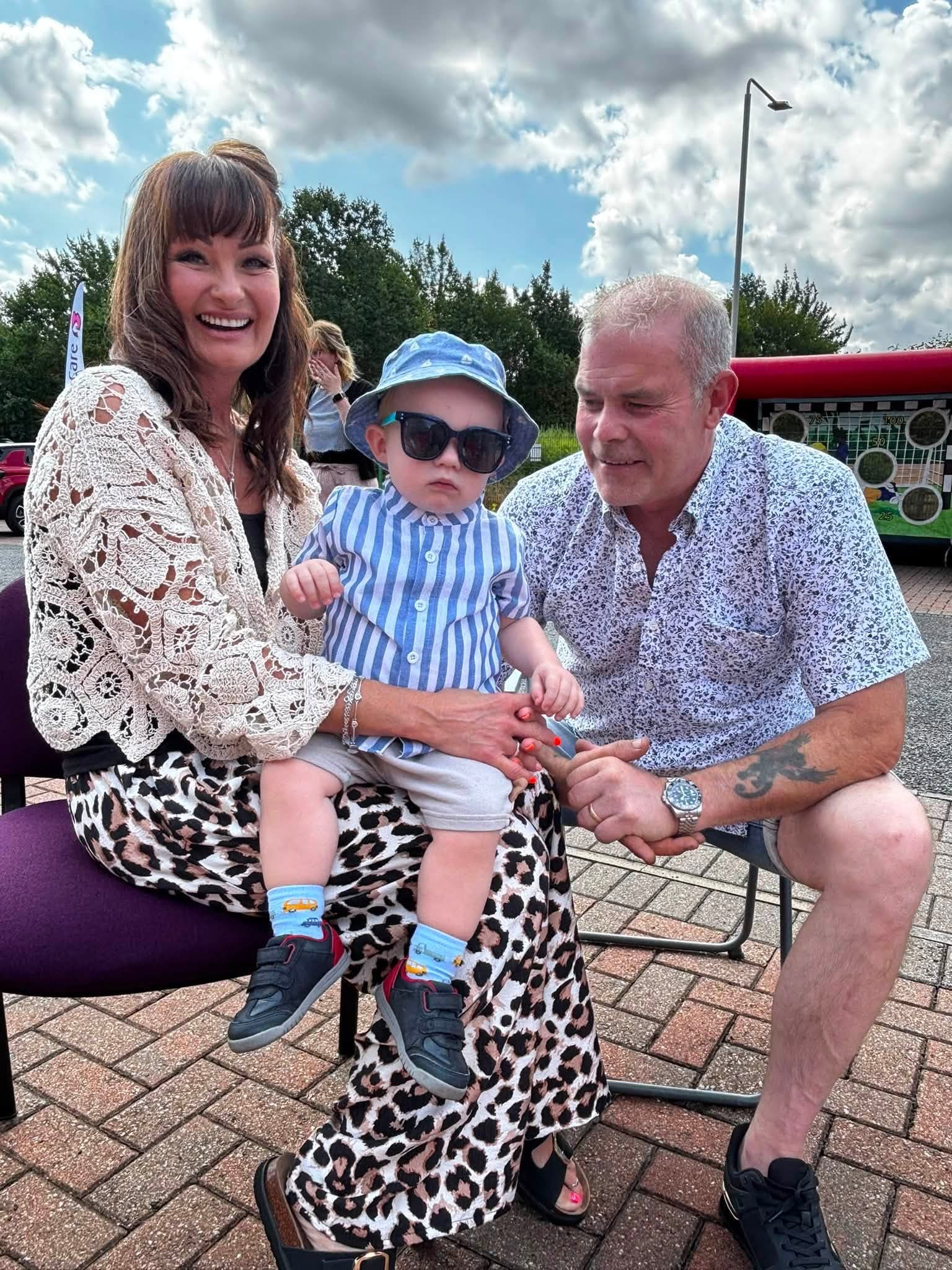 A family with their baby at the Your Home Care annual BBQ