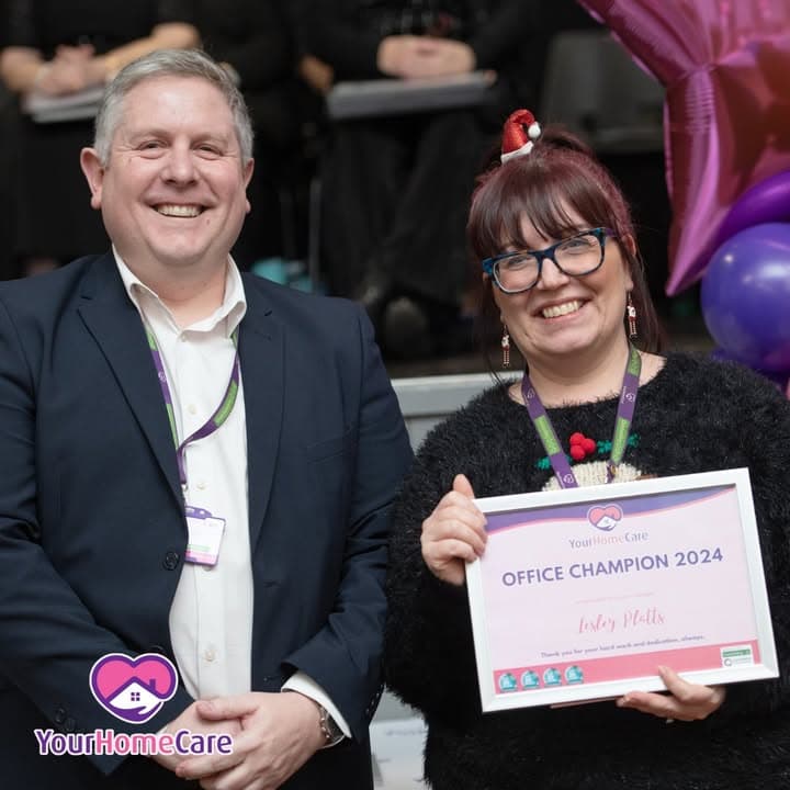 Lesley, Office Champion, receiving her award