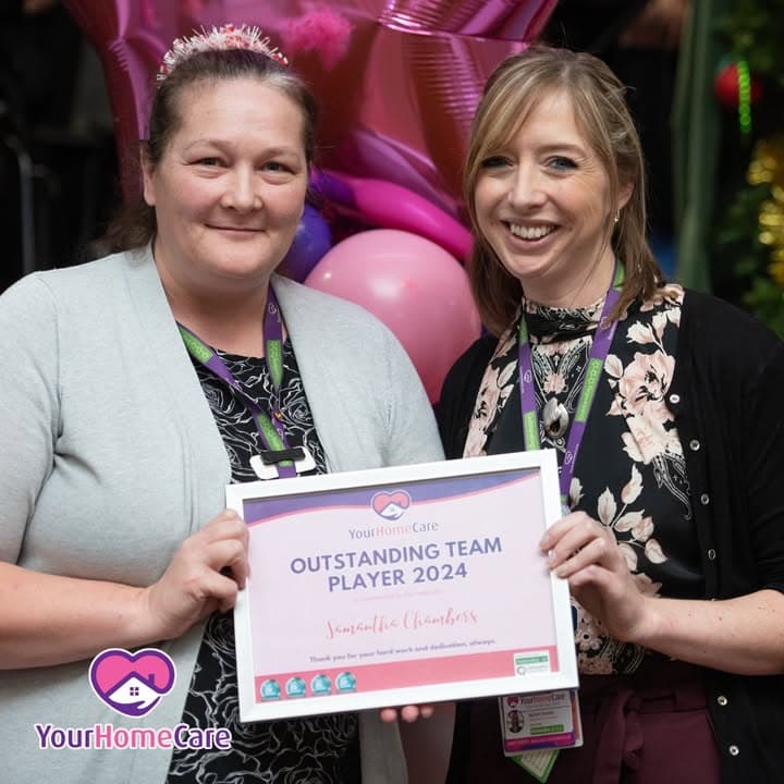 Sam, Outstanding Team Player, receiving her award