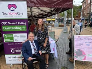 Aimee with a member of the public at the Carers Roadshow