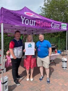 Scott, Denise and Paul with the Top 20 certificate